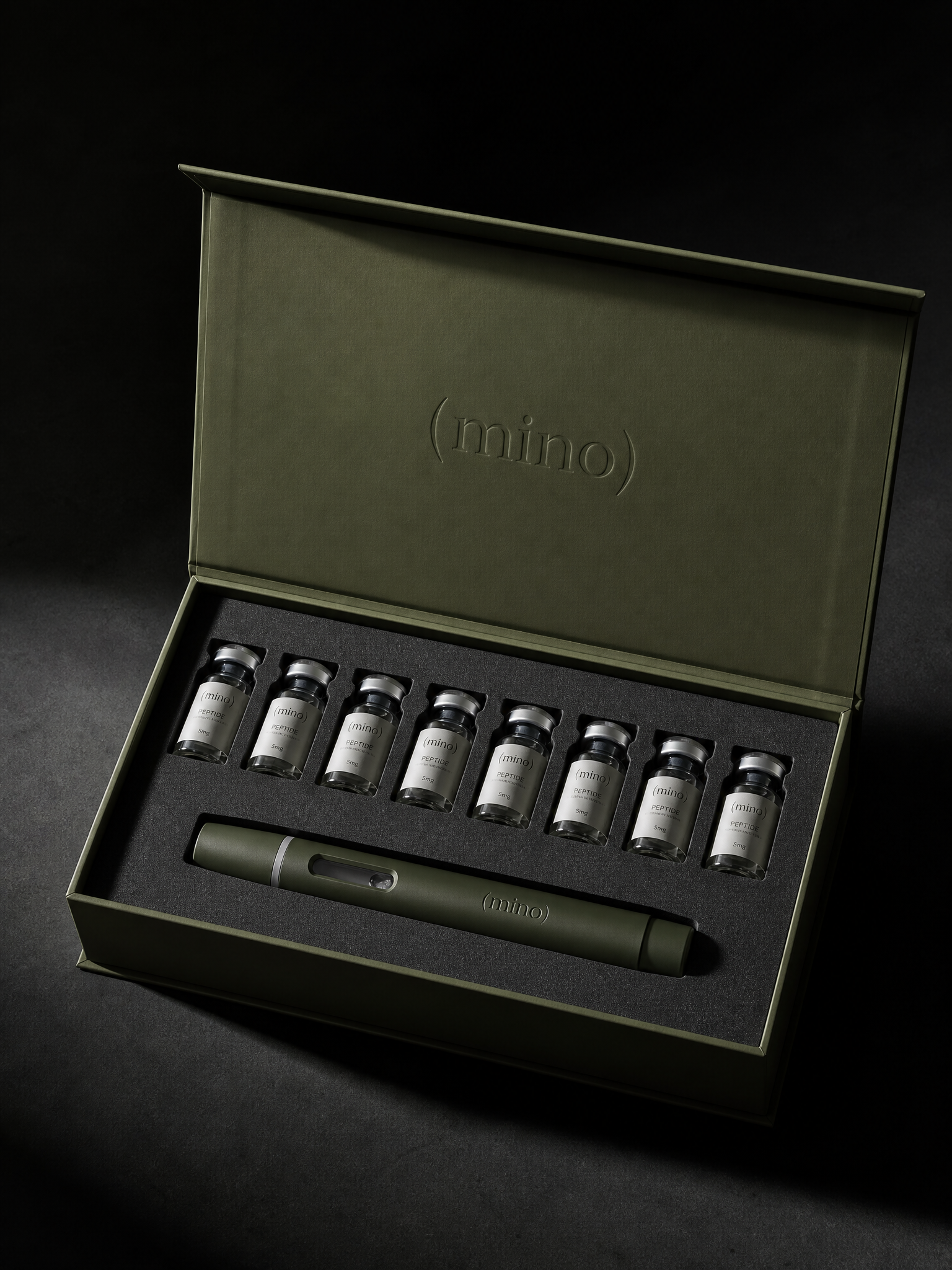 An open sage presentation box holding a row of labeled peptide vials and a slim pen